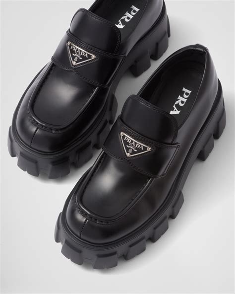 prada leather triangle logo loafers|prada monolith loafers women's.